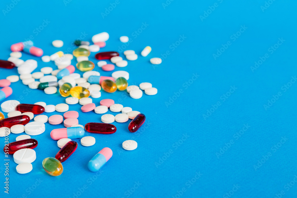 Many different colorful medication and pills perspective view. Set of many pills on colored background Many different colorful medication and pills perspective view. Set of many pills on colored background
