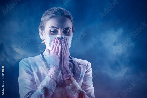 Woman in a medical mask. The comeback of the coronavirus. A new jump in the incidence of the Omicron strain. Doctor warns about the danger of coronavirus photo