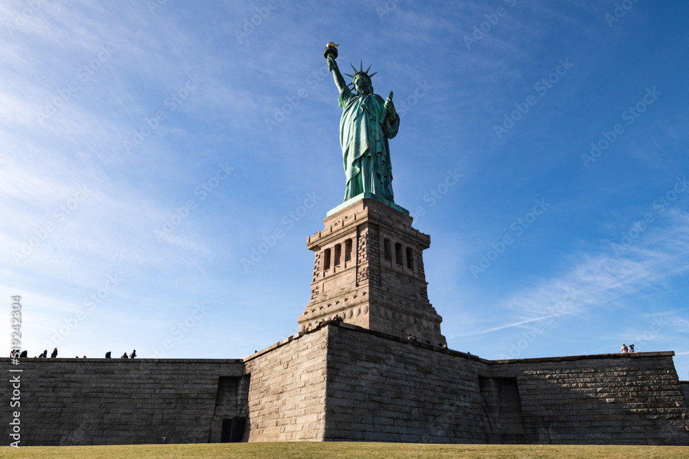 Fototapeta premium Statue of Liberty standing on base