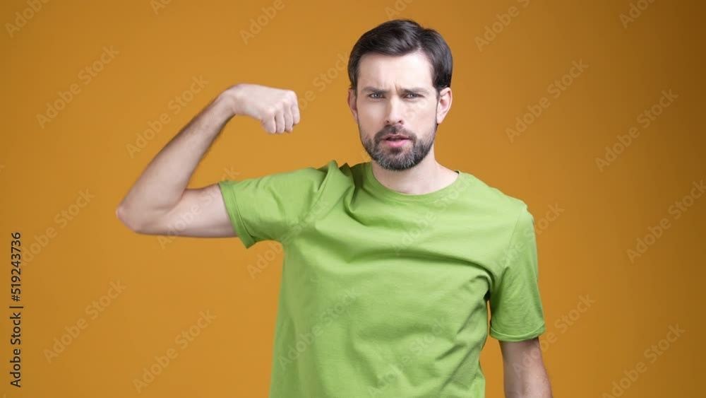 Sportive guy show muscles recommend news gym isolated bright color background Sportive guy show muscles recommend news gym isolated bright color background