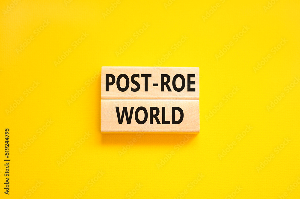Roe vs Wade post-Roe world symbol. Concept words Post-Roe world on wooden blocks on a beautiful yellow table yellow background. Business and Roe vs Wade post-Roe world concept. Copy space. Roe vs Wade post-Roe world symbol. Concept words Post-Roe world on wooden blocks on a beautiful yellow table yellow background. Business and Roe vs Wade post-Roe world concept. Copy space.