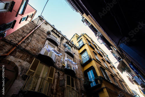 Old narrow street of Old Town of Napoli, traditional Italian architecture in Naples, Italy
