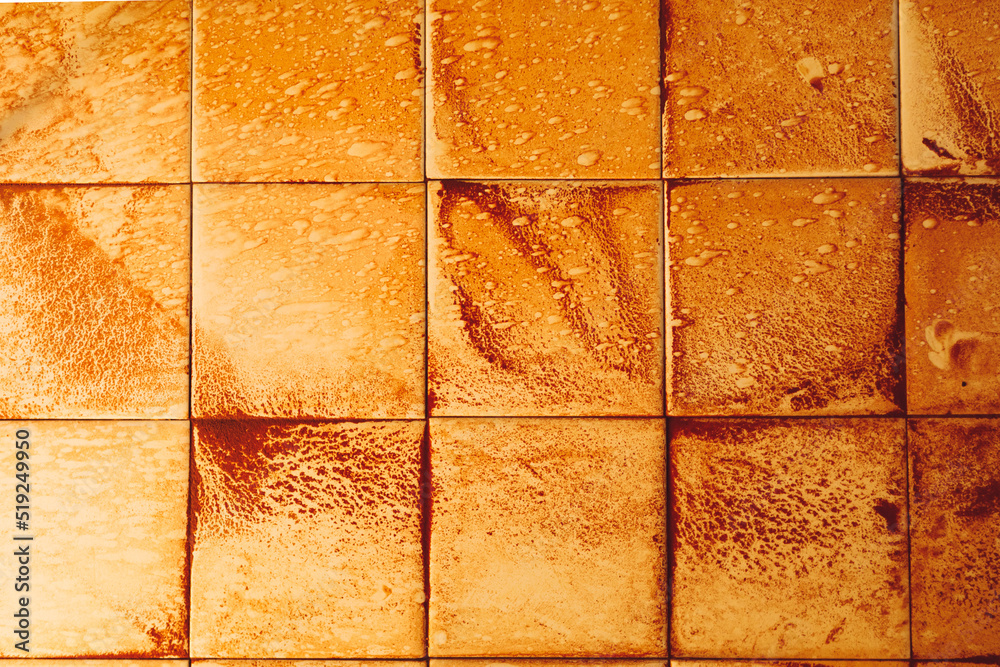 Naklejka premium abstract wet rust scattering on a tile background