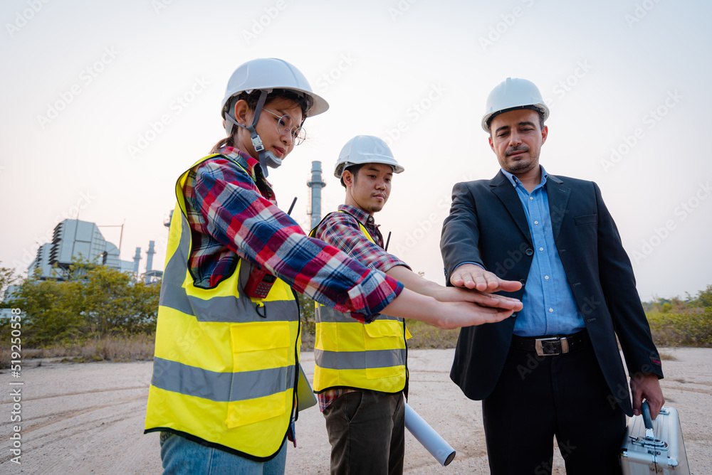 Businessman and engineer meeting and discuss project in working site, Teamwork project concept. Businessman and engineer meeting and discuss project in working site, Teamwork project concept.