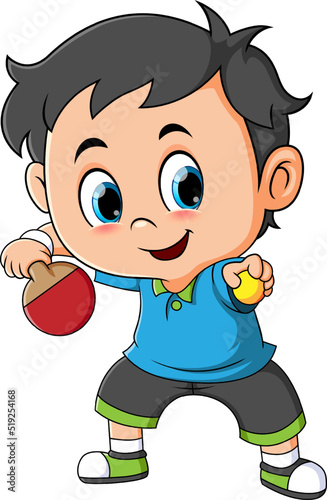 The boy is playing the tennis table and hitting the ball