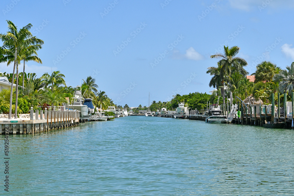 Waterfront homes and boats along the waterway in Marathon key in the Florida Keys