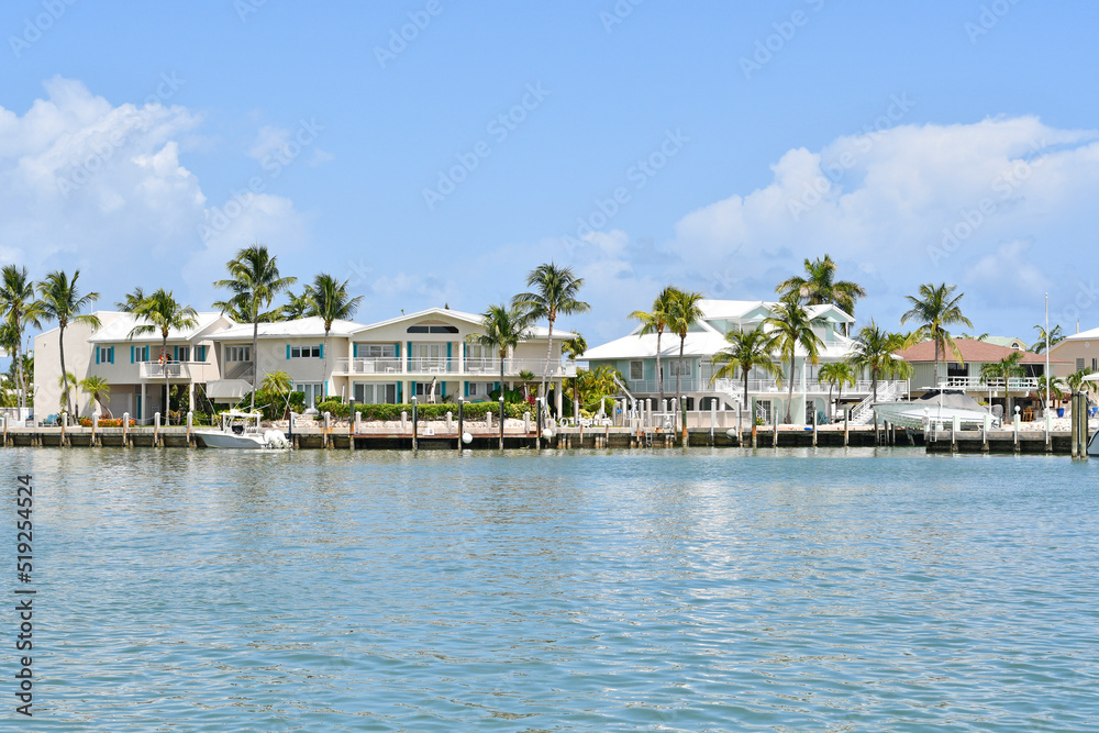 Waterfront homes and boats along the waterway in Marathon key in the