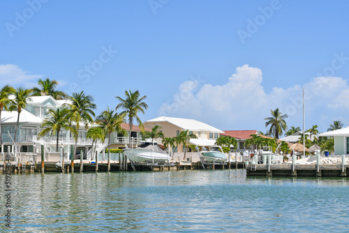 Waterfront homes and boats along the waterway in Marathon key in the Florida Keys © Ryan Tishken