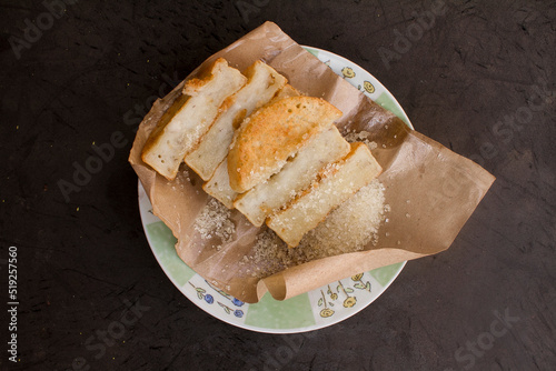 This pancong cake comes from Jakarta, so it is often referred to as Betawi food. Pancong cake has a characteristic savory and salty taste photo