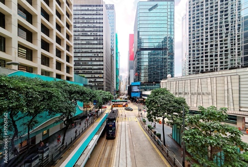 Photography Scenery of downtown Hong Kong with view of a streetcar traveling on the tramway