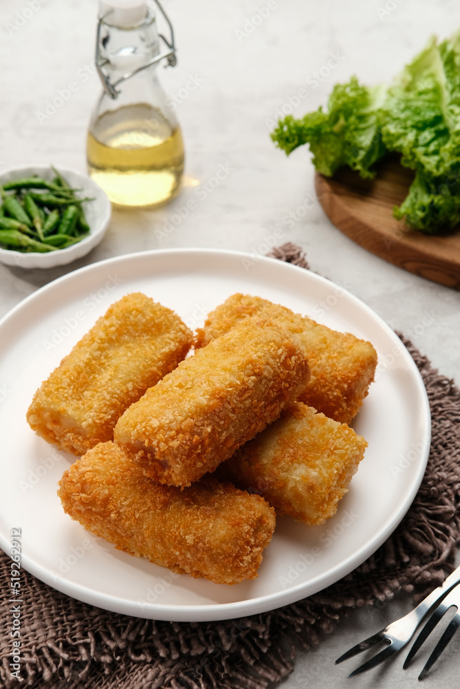 Risol Mayo, Risoles mayo with mozzarella filling, a small patty enclosed in pastry or rolled in bread crumbs. it is filled with smoked beef, mayonnaise, boiled egg and mozzarella cheese. Risol Mayo, Risoles mayo with mozzarella filling, a small patty enclosed in pastry or rolled in bread crumbs. it is filled with smoked beef, mayonnaise, boiled egg and mozzarella cheese.