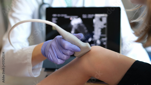 Photography Woman physician diagnosing injuries or defects of kid