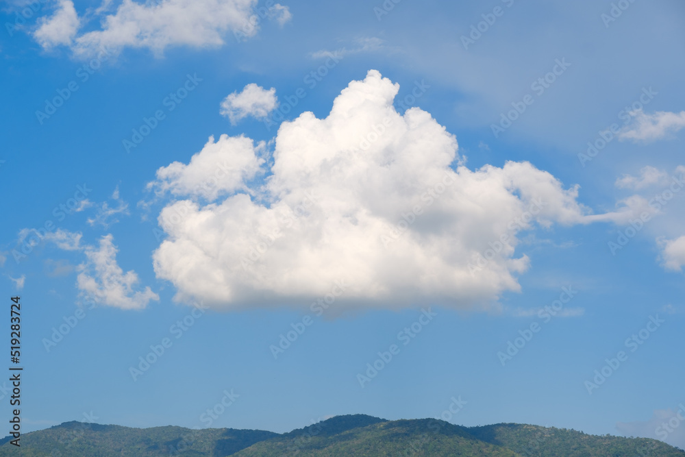 The white clouds have a strange shape and moutain.The sky and the open space have mountains below. The white clouds have a strange shape and moutain.The sky and the open space have mountains below.