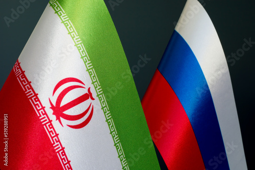 Flags of Iran and Russia as a symbol of diplomatic relations. photo