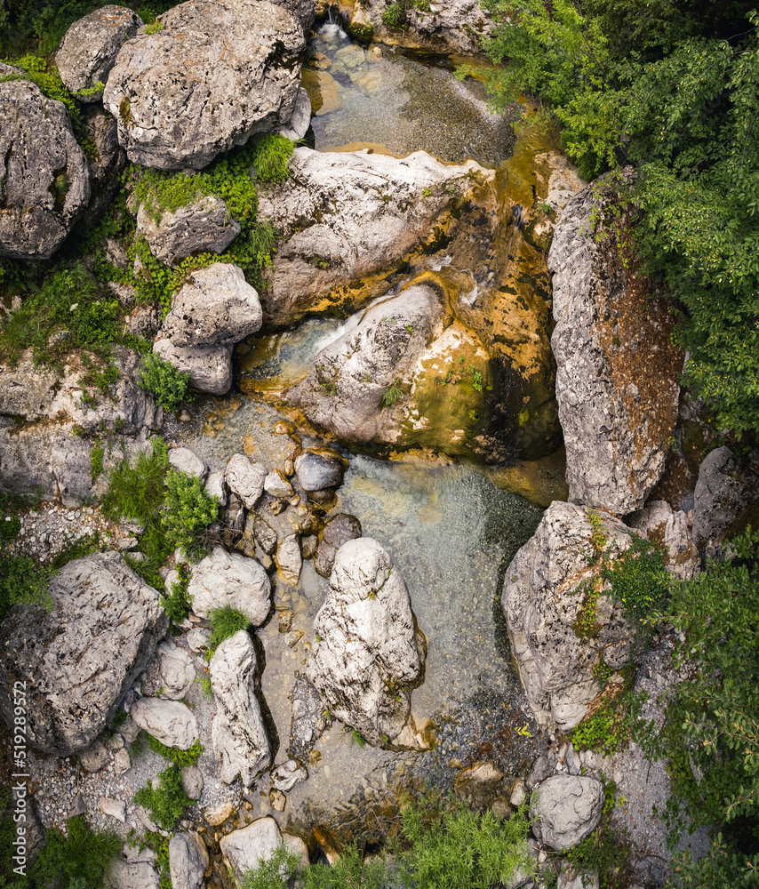 Drone aerial shot of a natural wild Prionia river. Travel destination concept. Nature and its beauty. High quality photo Drone aerial shot of a natural wild Prionia river. Travel destination concept. Nature and its beauty. High quality photo