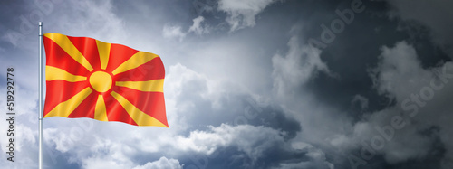 Cuadro en lienzo Macedonian flag on a cloudy sky