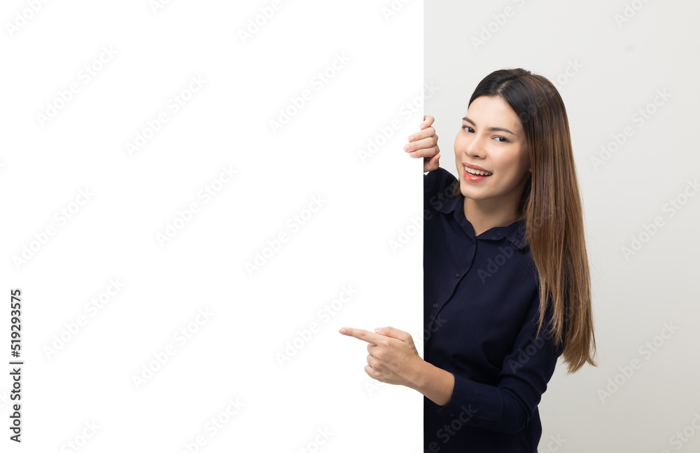 Portrait of Young beautiful mixed race woman standing and smiling on isolated white background with big mockup billboard for advertising text. Portrait of Young beautiful mixed race woman standing and smiling on isolated white background with big mockup billboard for advertising text.