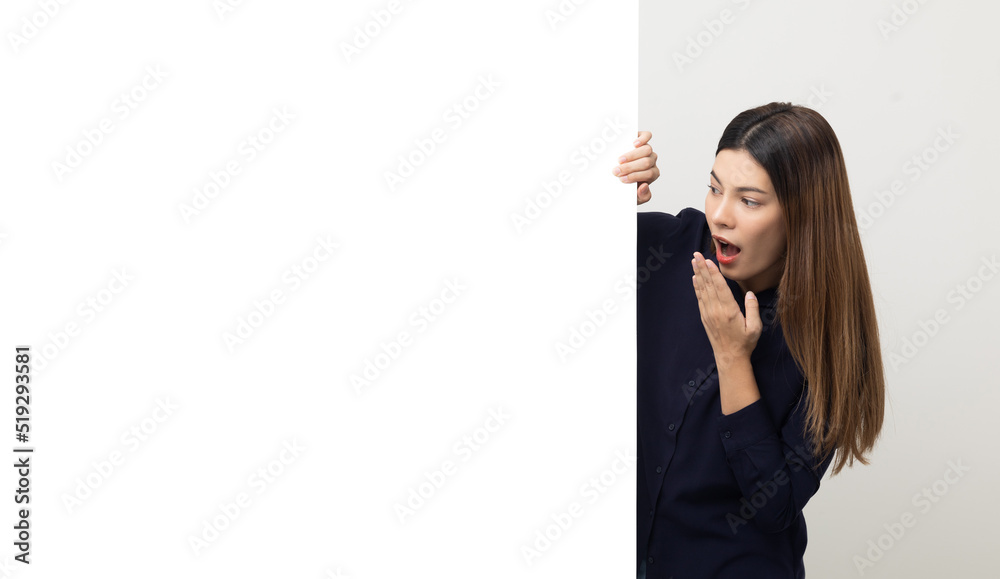 Portrait of Young beautiful mixed race woman standing and smiling on isolated white background with big mockup billboard for advertising text. Portrait of Young beautiful mixed race woman standing and smiling on isolated white background with big mockup billboard for advertising text.
