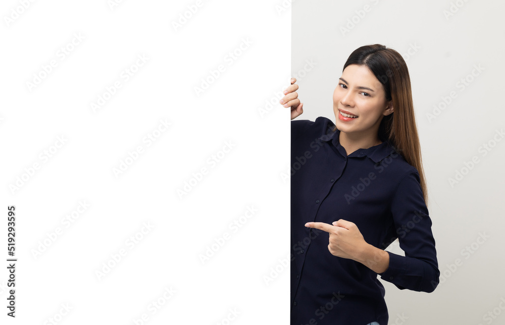 Portrait of Young beautiful mixed race woman standing and smiling on isolated white background with big mockup billboard for advertising text. Portrait of Young beautiful mixed race woman standing and smiling on isolated white background with big mockup billboard for advertising text.