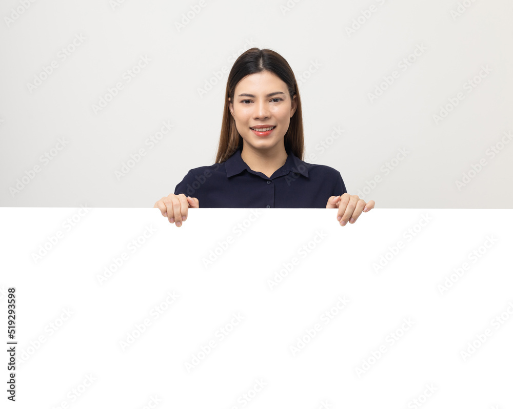 Portrait of Young beautiful mixed race woman standing and smiling on isolated white background with big mockup billboard for advertising text. Portrait of Young beautiful mixed race woman standing and smiling on isolated white background with big mockup billboard for advertising text.