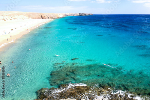 Landscape over Playa Mujeres (Mujeres beach) in Lanzarote, Canary Island, Atlantic Ocean in a sunny summer day