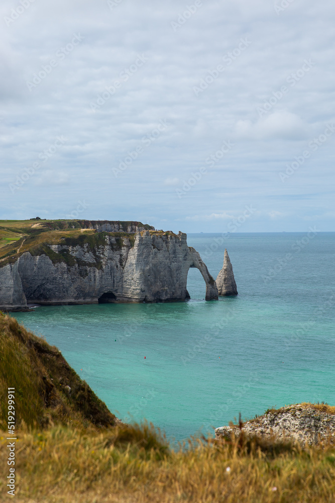 Amazing view of the beach in Normandy in France in the town of etritat from a height of the English Channel and rocks.