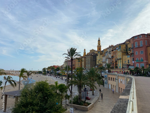 Menton, France, October 2, 2021: The Basilica of Saint-Michael the Archangel and Sablettes beach, located between the two ports (the Old Port and Garavan), along the Quai Bonaparte and the old town. © An Instant of Time