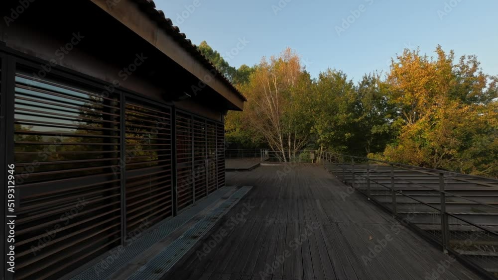 Wooden terrace and gazebo in park of Portugal, dolly backward view Wooden terrace and gazebo in park of Portugal, dolly backward view