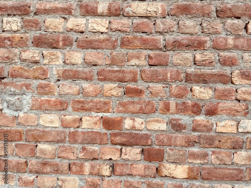 Red brick wall. Texture of old dark brown and red brick wall panoramic backgorund.Old red brick wall background, wide panorama of masonry.red brick wall texture grunge background.