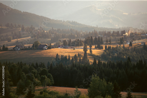 Carpathian Mountains in the sunset, Piatra Fantanele , Romania photo