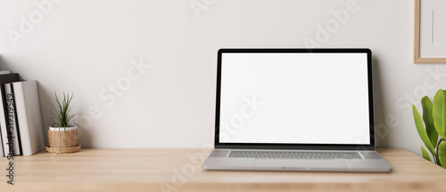 Wallpaper Mural Minimal working desk with opened notebook laptop mockup over white wall. Torontodigital.ca
