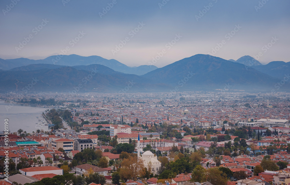 Fototapeta premium Aerial view popular tourist city of Fethiye landscape and cityscape. View from top. Fethiye, Mediterranean sea, Turkey.