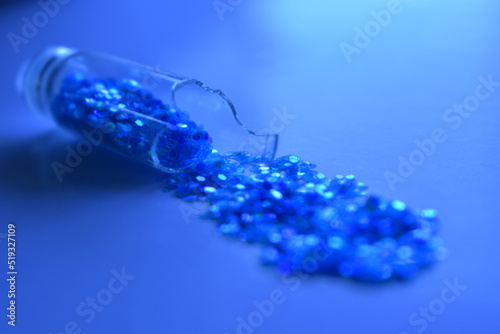glass bottle of blue glitter