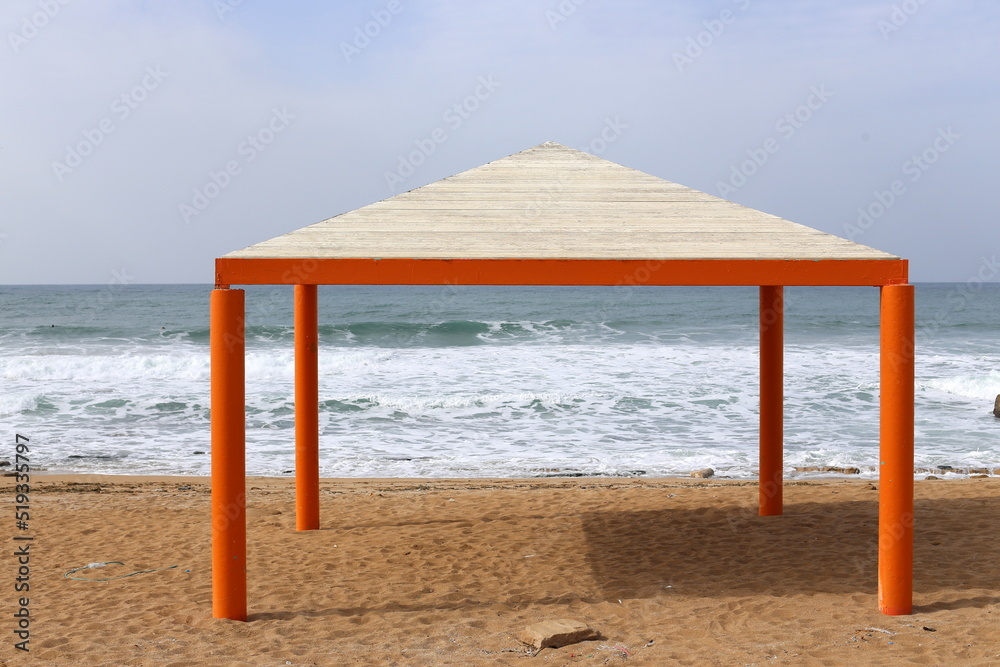Canopy from the scorching sun on the seashore. Canopy from the scorching sun on the seashore.