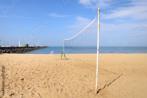 Beautiful tropical sea beach with  volleyball net in summer time.