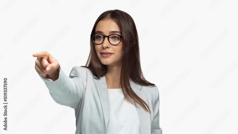 successful businesswoman in grey jacket and eyeglasses pointing with finger isolated on white. successful businesswoman in grey jacket and eyeglasses pointing with finger isolated on white.