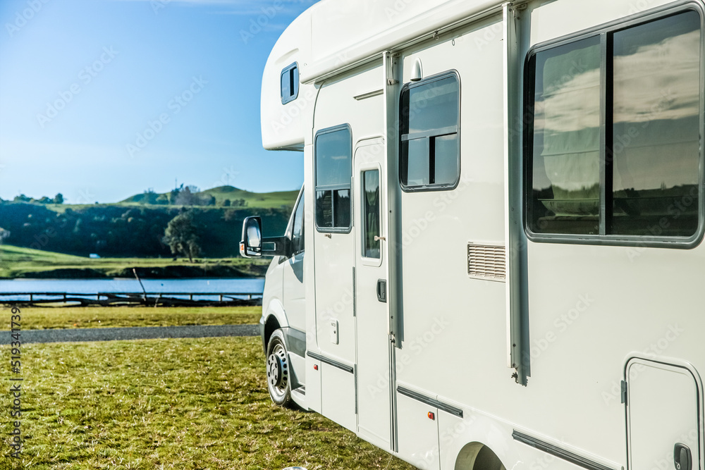 motorhome on a camping ground, caravan vacations, campervan trip motorhome on a camping ground, caravan vacations, campervan trip