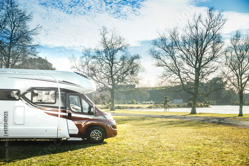 motorhome on a camping ground, caravan vacations, campervan trip