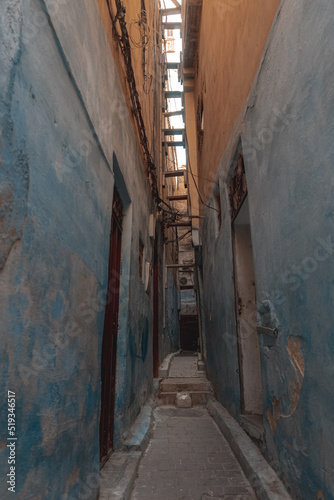 Empty narrow street in the old medina of Fes © Hamza
