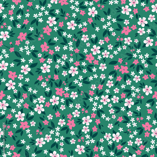 Simple vintage pattern. small white and pink flowers, dark green leaves. green background. Fashionable print for textiles and wallpaper.