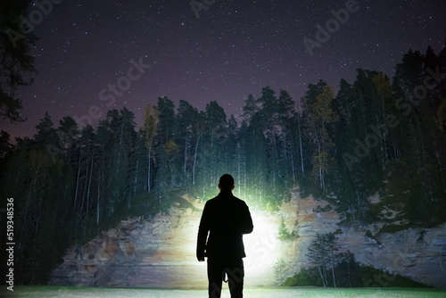 man in the forest at night