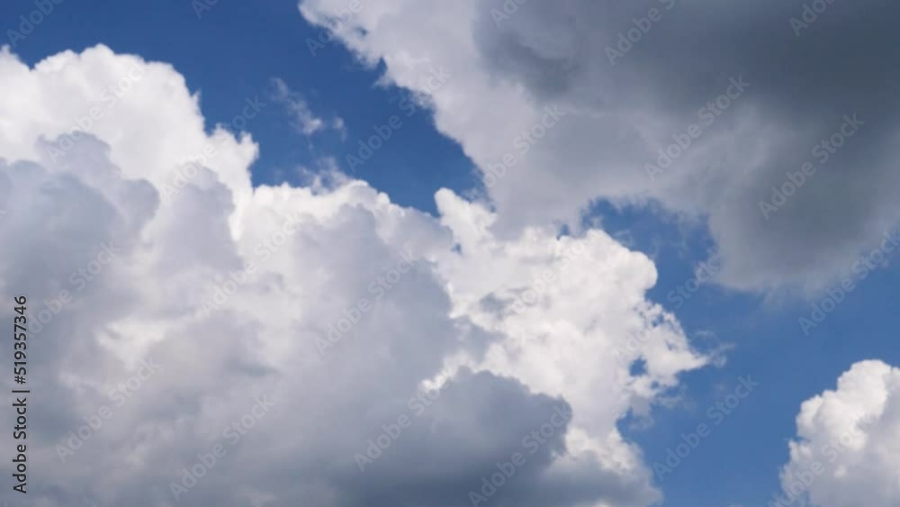 Blue sky white clouds. Puffy fluffy white clouds. Cumulus cloud cloudscape . Summer blue sky time lapse. Nature weather blue sky. White clouds background. Cloud time Blue sky white clouds. Puffy fluffy white clouds. Cumulus cloud cloudscape . Summer blue sky time lapse. Nature weather blue sky. White clouds background. Cloud time