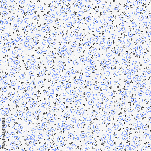 Vector seamless pattern. Pretty pattern in small flowers. Small blue flowers. White background. Ditsy floral background. The vintage template for fashion prints. Stock vector.