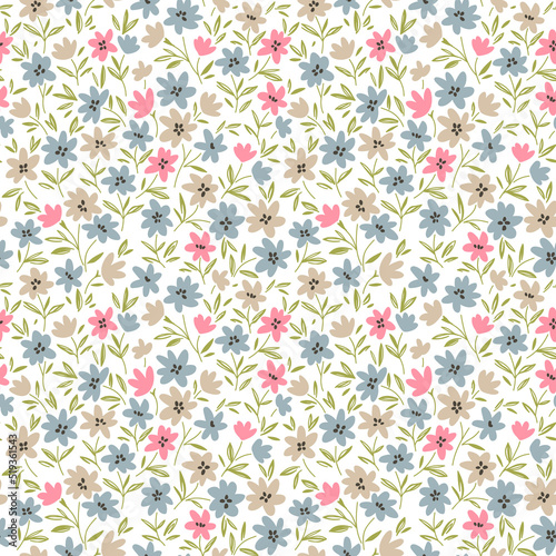 Vintage seamless floral pattern. Liberty style background of small pastel colorful flowers. Small flowers scattered over a white background. Stock vector for printing on surfaces. Abstract flowers.
