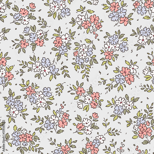 Cute floral pattern in the small flower. Seamless vector texture. Elegant template for fashion prints. Printing with small white, blue and pink flowers. Light white gray background. Stock print.