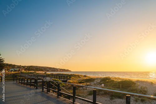 New esplanade as part of from Glenelg to Seacliff coastal walk at sunset, South Australia