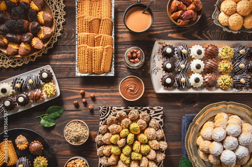 Arabic Cuisine; Cookies for celebration of El-Fitr Islamic Feast.(The Feast that comes after Ramadan). Varieties of Eid Al-Fitr sweets (kahk,biscuits, petit four). Top view with close up.
