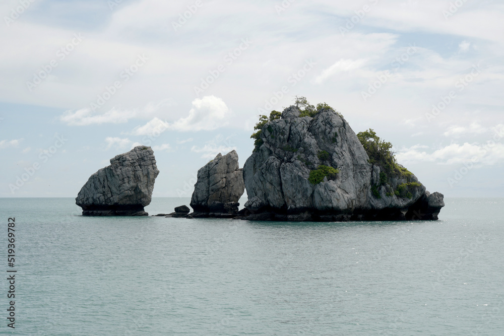 Three rock or limestone in the sea - beautiful nature of Angthong Islands National Marine Park from Samui island Thailand. Travel adventure outdoor 