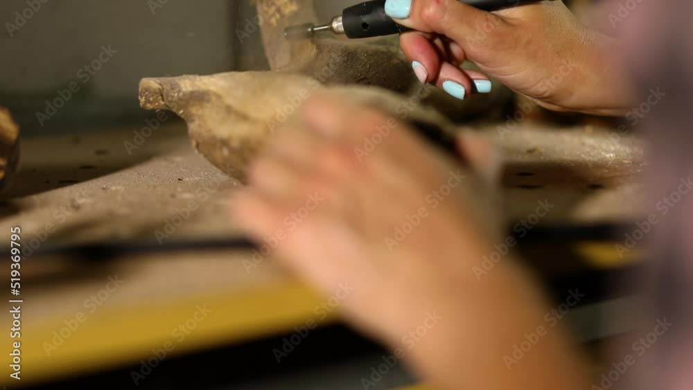 Female using power wood working tools graver, carving while crafting, Female using power wood working tools graver, carving while crafting,