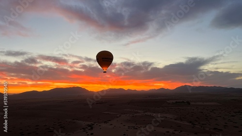 Hot Air Balloon Over the Desert Sunrise